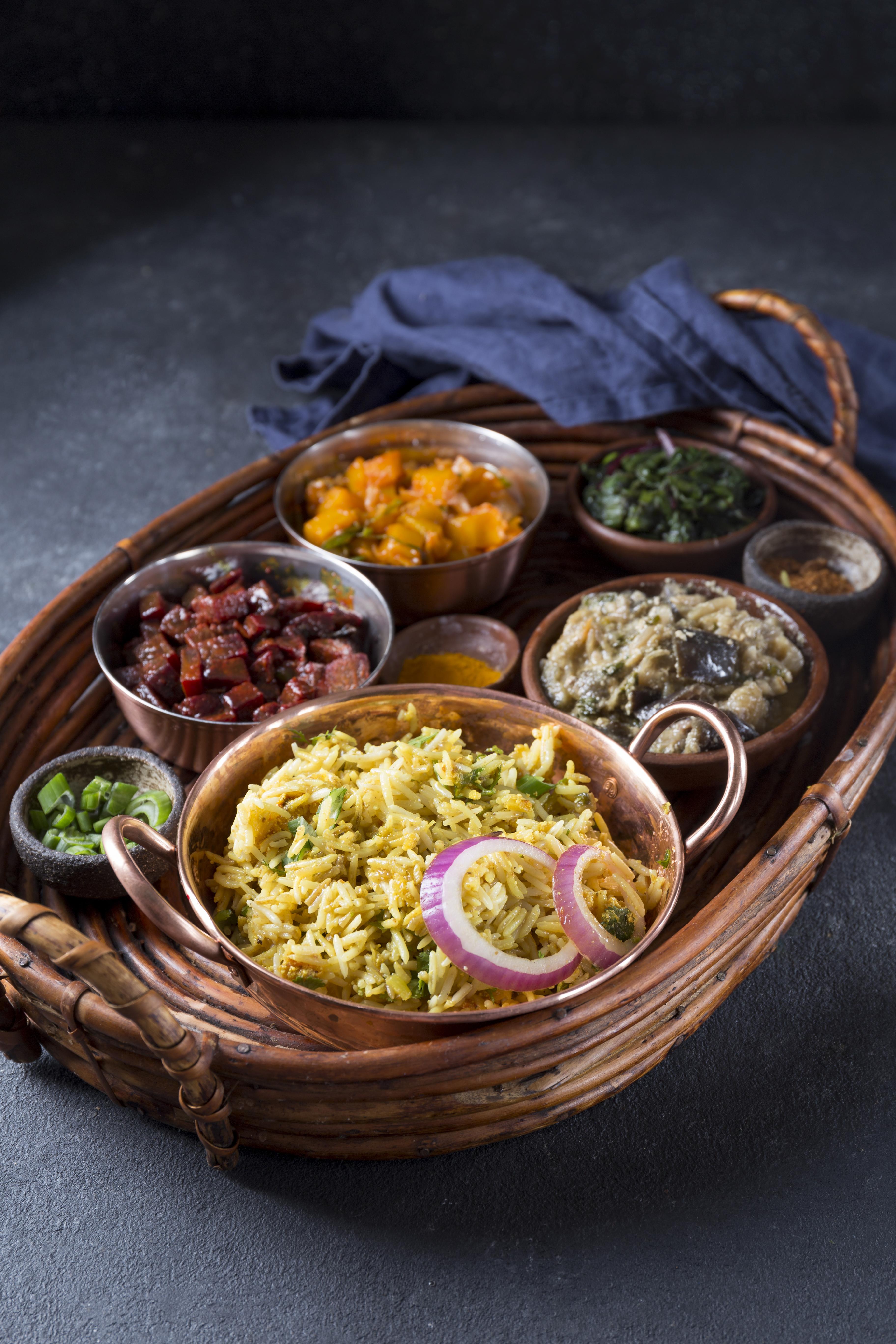 Traditional vegetarian meal arrangement basket - PetPuja Cloud tiffin home delivery service Guwahati Assam